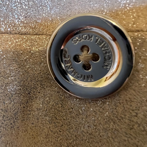 This is a MK leather jacket Size 2. Purchased on Thredup. It’s in great shape. - Picture 14 of 17